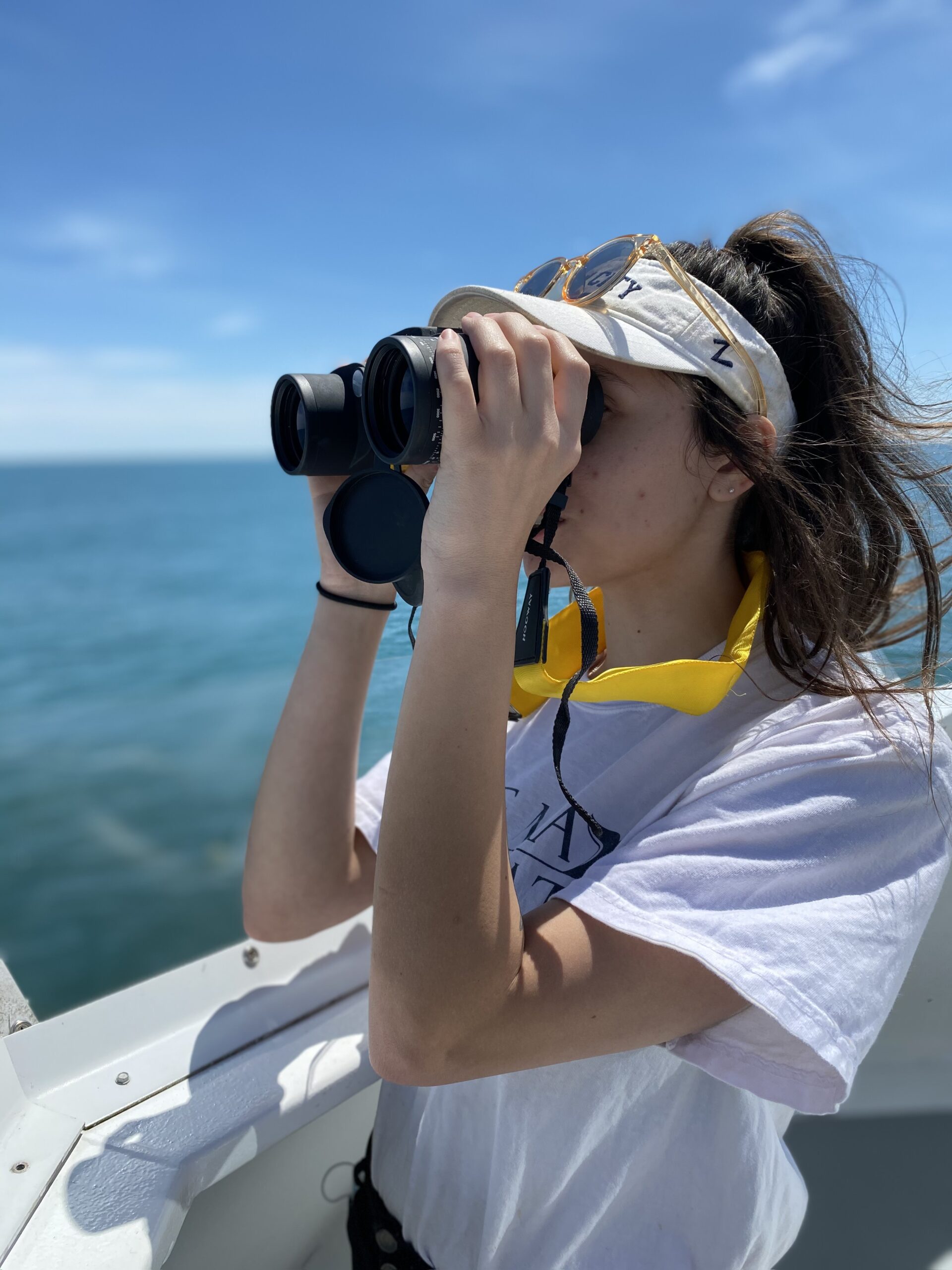 a person talking on a cell phone in the water
